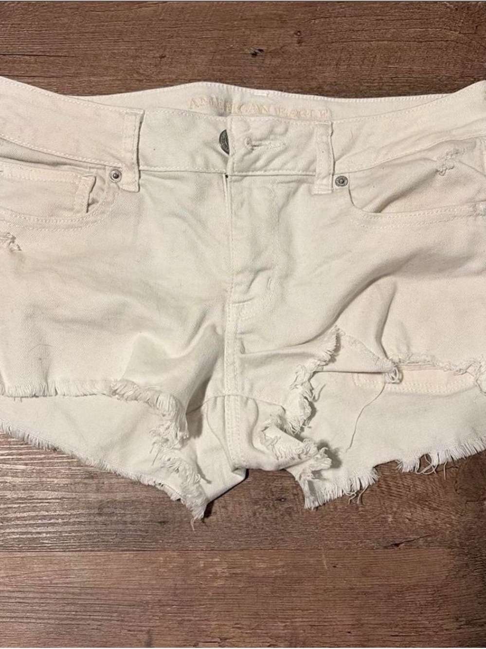 American Eagle Outfitters Cream Distressed Denim Cutoff Shorts